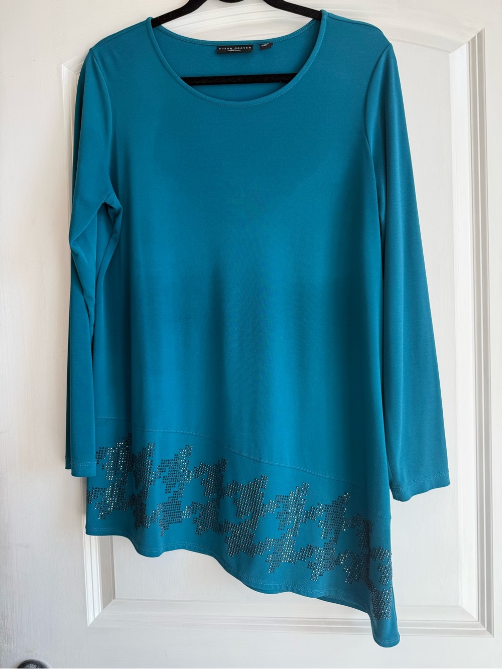 Susan Graver Teal Long-Sleeve Asymmetric Top with Stud Detail. No wrinkle fabric